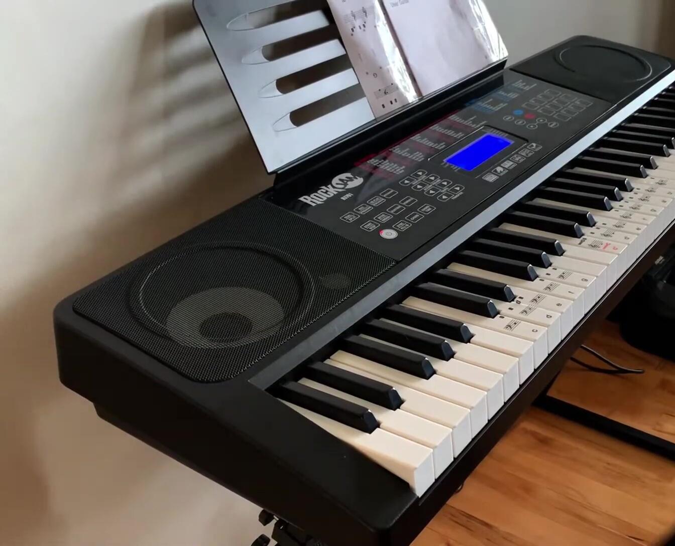 Adult playing the keyboard