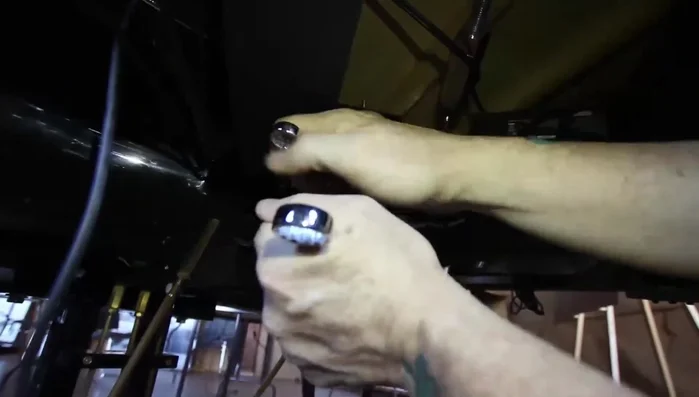 Adjust the long cap nut until there is minimal travel before the dampers start to lift.