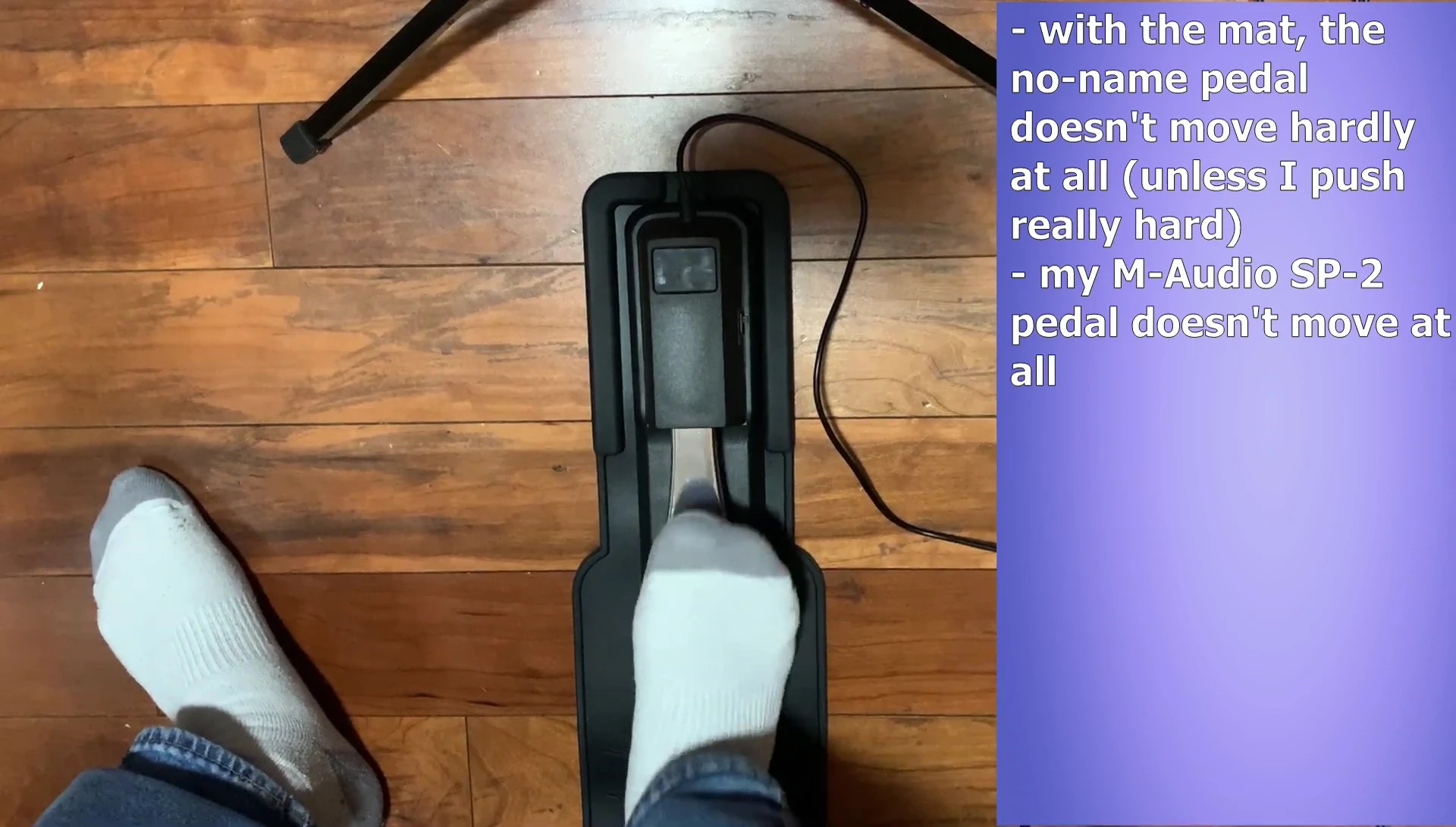 The cheap pedal on the mat, showing no movement.