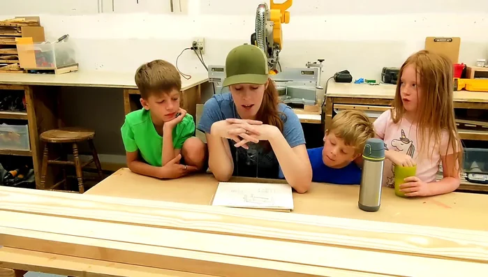 Create half-laps on the legs to receive the cross braces. This involves precisely measuring and cutting half-inch recesses.