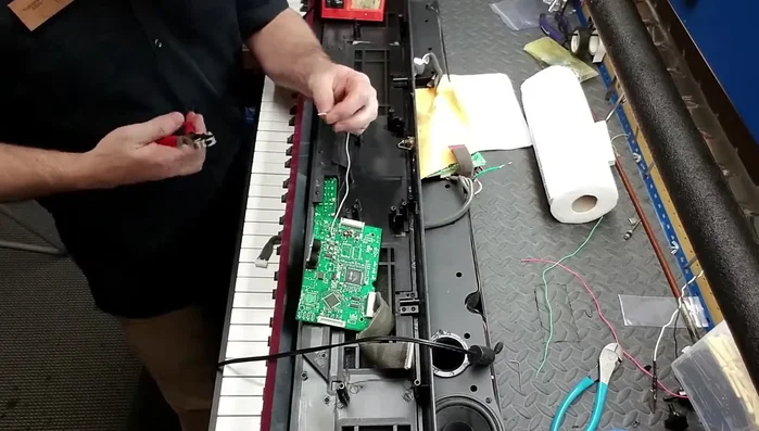 Reassemble the digital piano and test the damper pedal functionality.