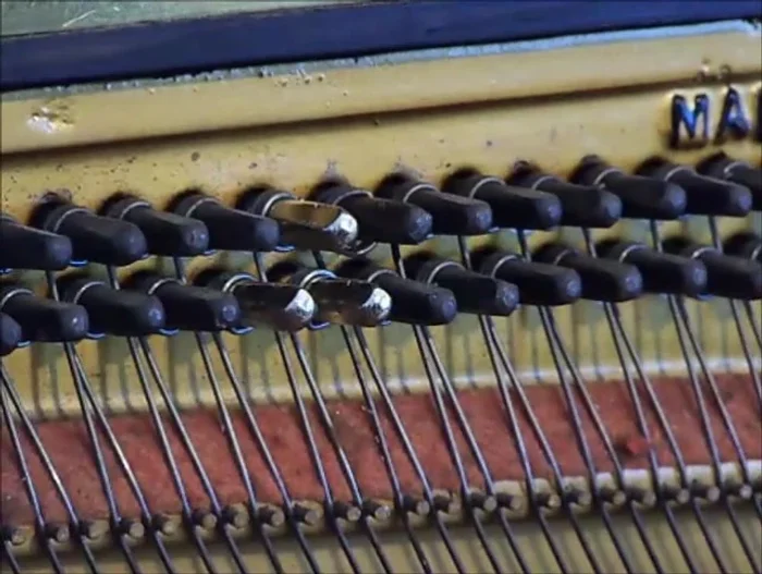 Use the tuning hammer to loosen and remove the remaining portion of the old pin.