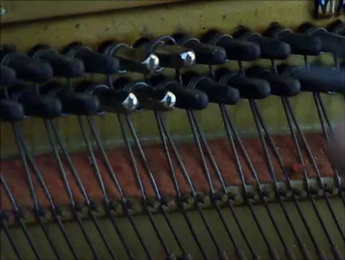 Tighten the new pin slightly (about a quarter turn), using needlenose pliers to crimp the string in place.