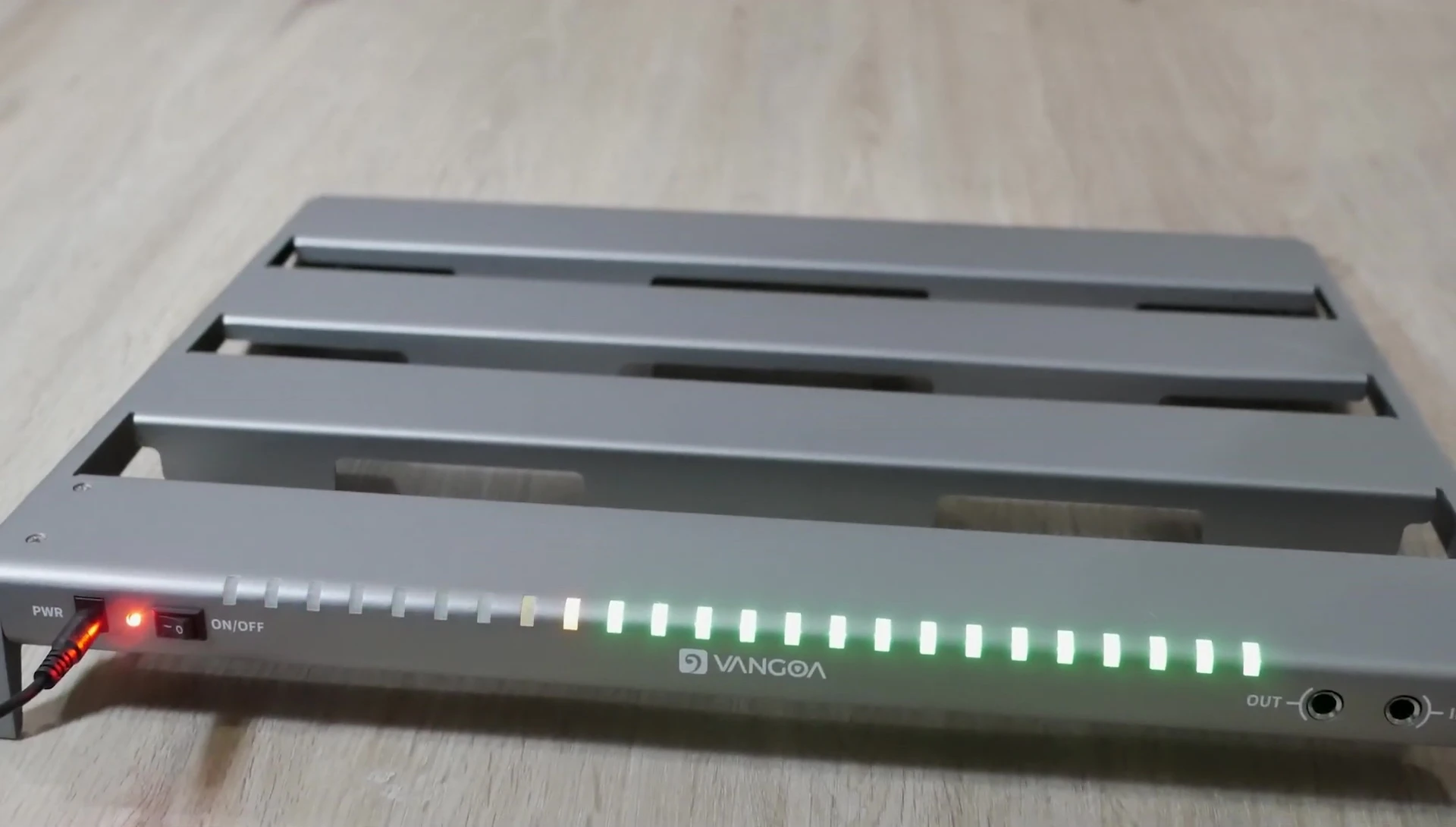 The pedalboard with the sound activated LEDs illuminated.
