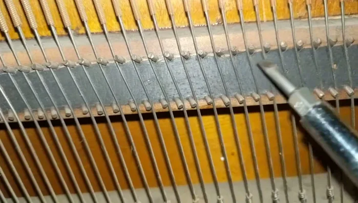 Clean the pedals to remove built-up wax and dirt using brillo pads.