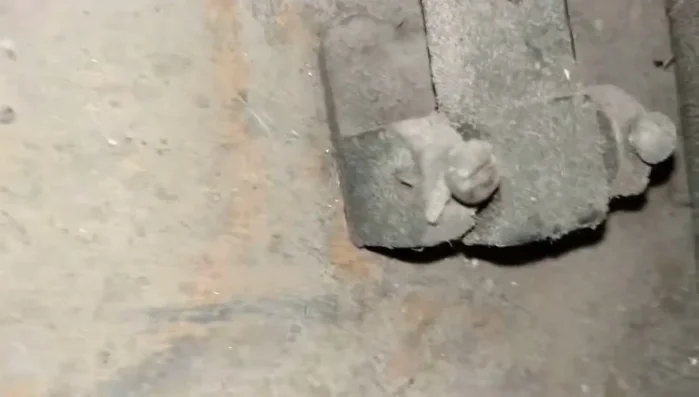 Re-tighten the top screw about half a turn.