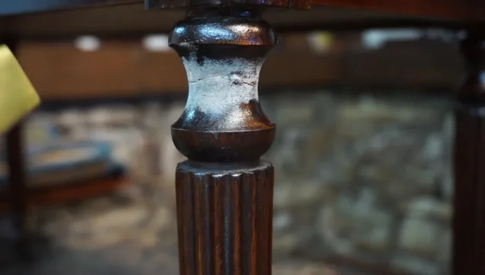 Sand the repair smooth using 220 sandpaper. Use wood filler if needed.