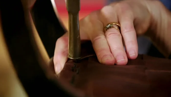 Continue until all leather pieces are in place.