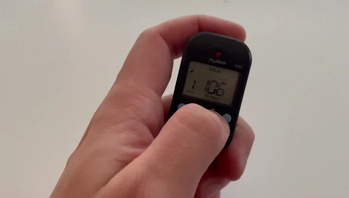 Adjust the volume using the up/down buttons.