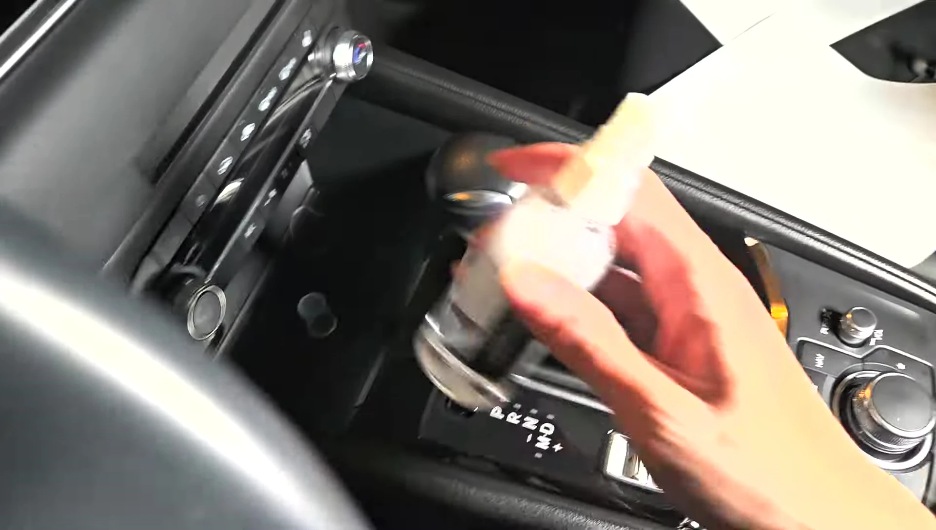 Cleaning the center console before applying the film.