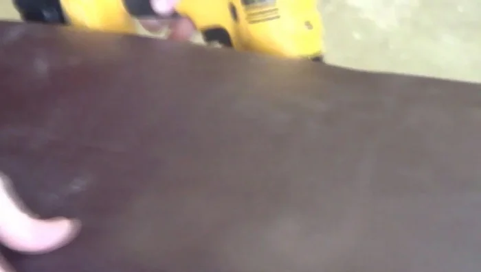 Attach the completed cushion to the piano bench using screws.