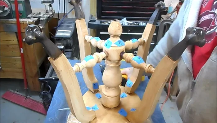 Disassemble the stool: Carefully remove the legs, stretchers, and seat, marking each piece for reassembly. Use a heat gun to loosen stubborn glue joints, being mindful of the paint.