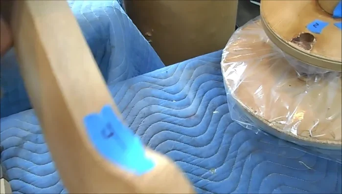 Repair damaged threads: If the central finial threads are stripped, glue in pieces of veneer to reduce the hole diameter, allowing the finial to thread back on securely.