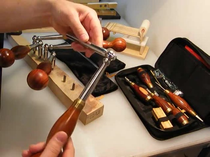 Showcase of wood grain variations in different levers.