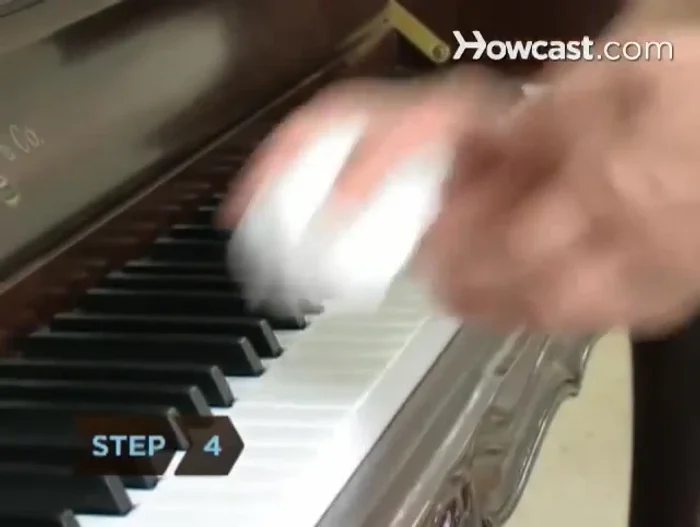 Immediately dry the keys with another lint-free cloth.