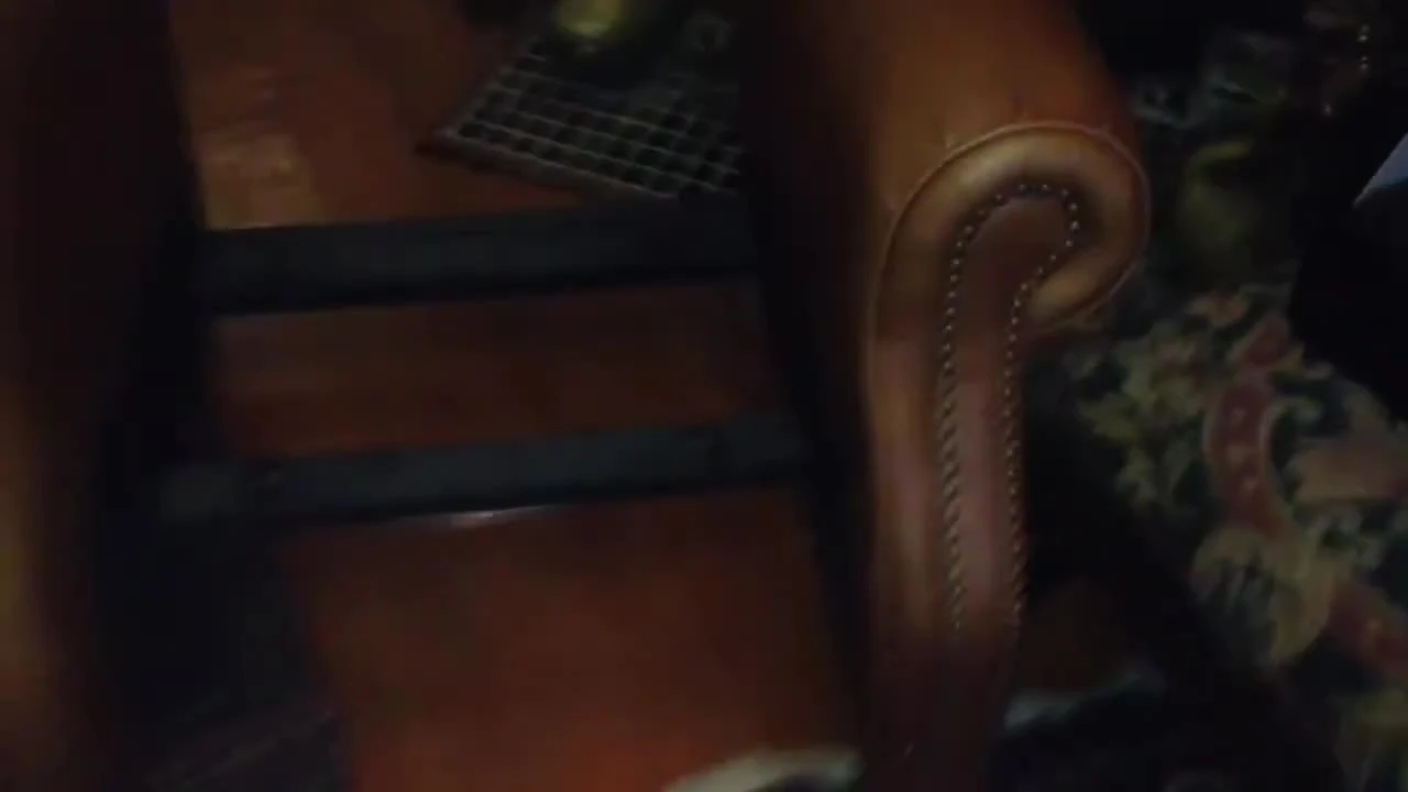 Close-up of the four bolts at the base of the recliner