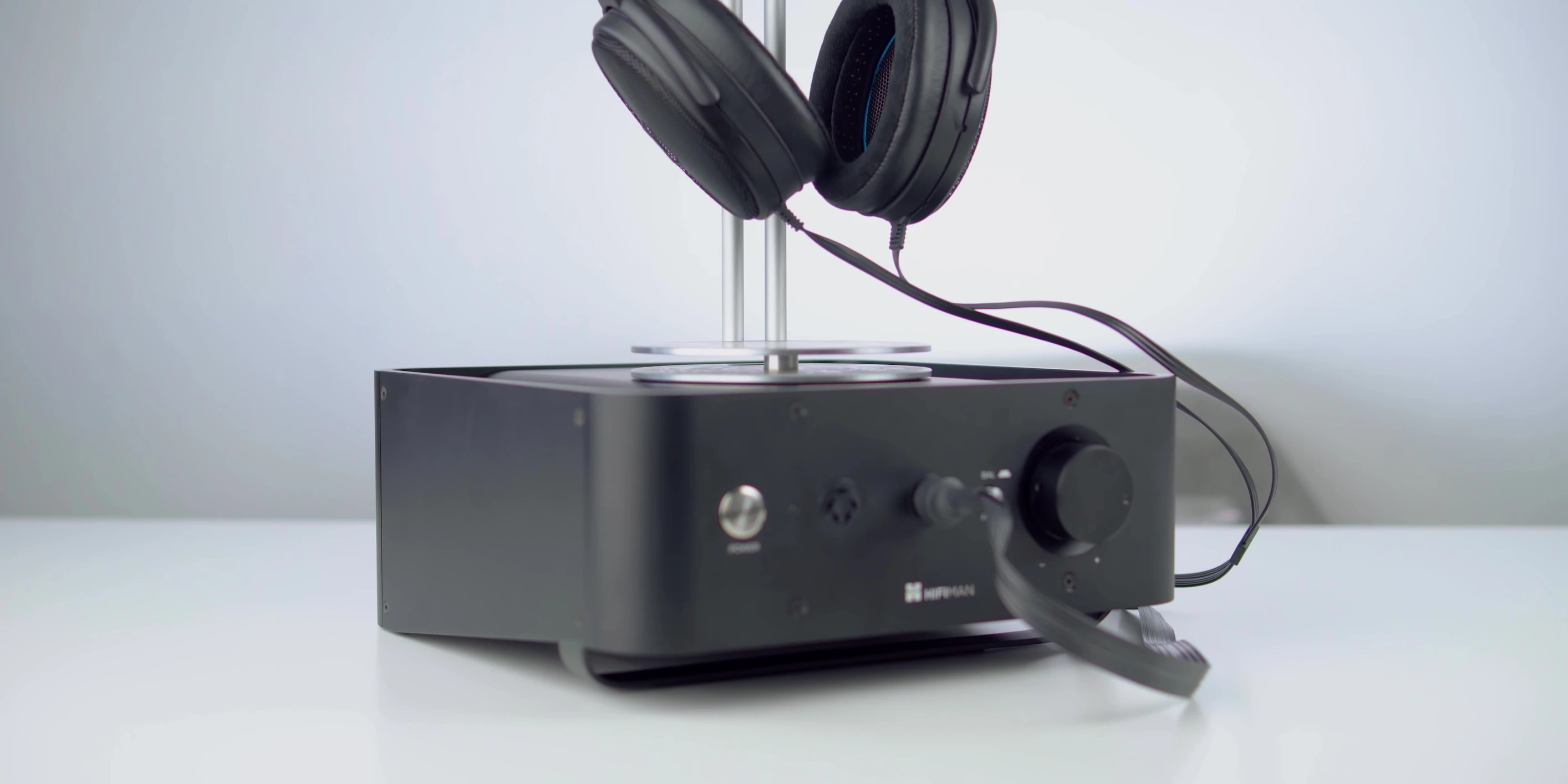 The reviewer listening to the headphones