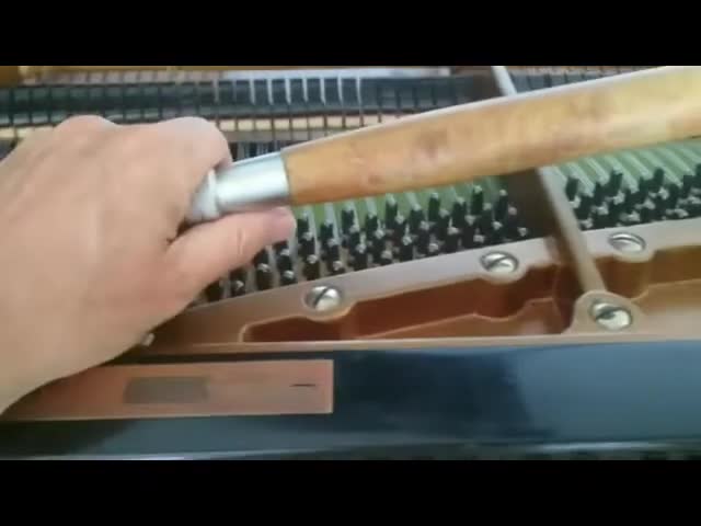 The inexpensive Chinese tuning hammer used in the tuning process.