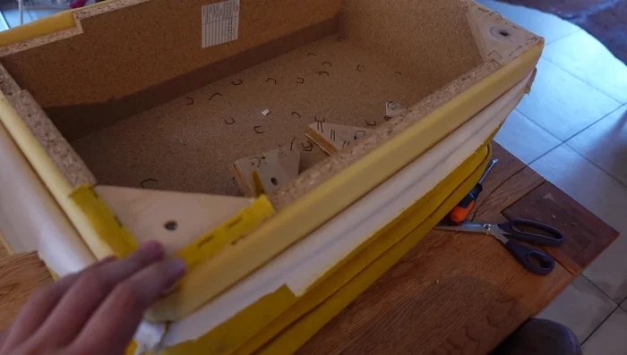 Trim the excess foam padding to achieve a flat top surface.