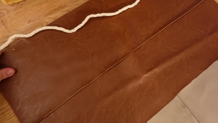 Attach the side panels, tucking and stapling them for a clean finish.