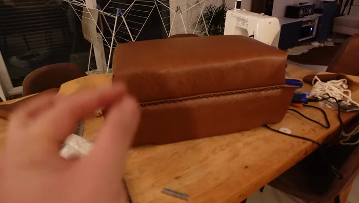 Attach the side panels, tucking and stapling them for a clean finish.