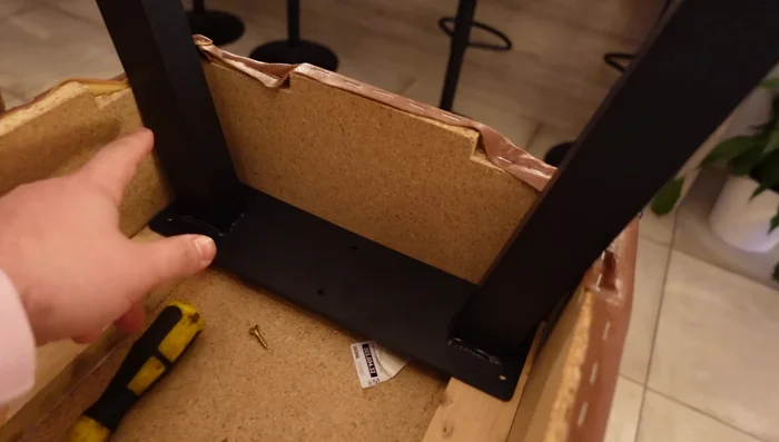 Attach the legs using wood glue and screws, ensuring stability.