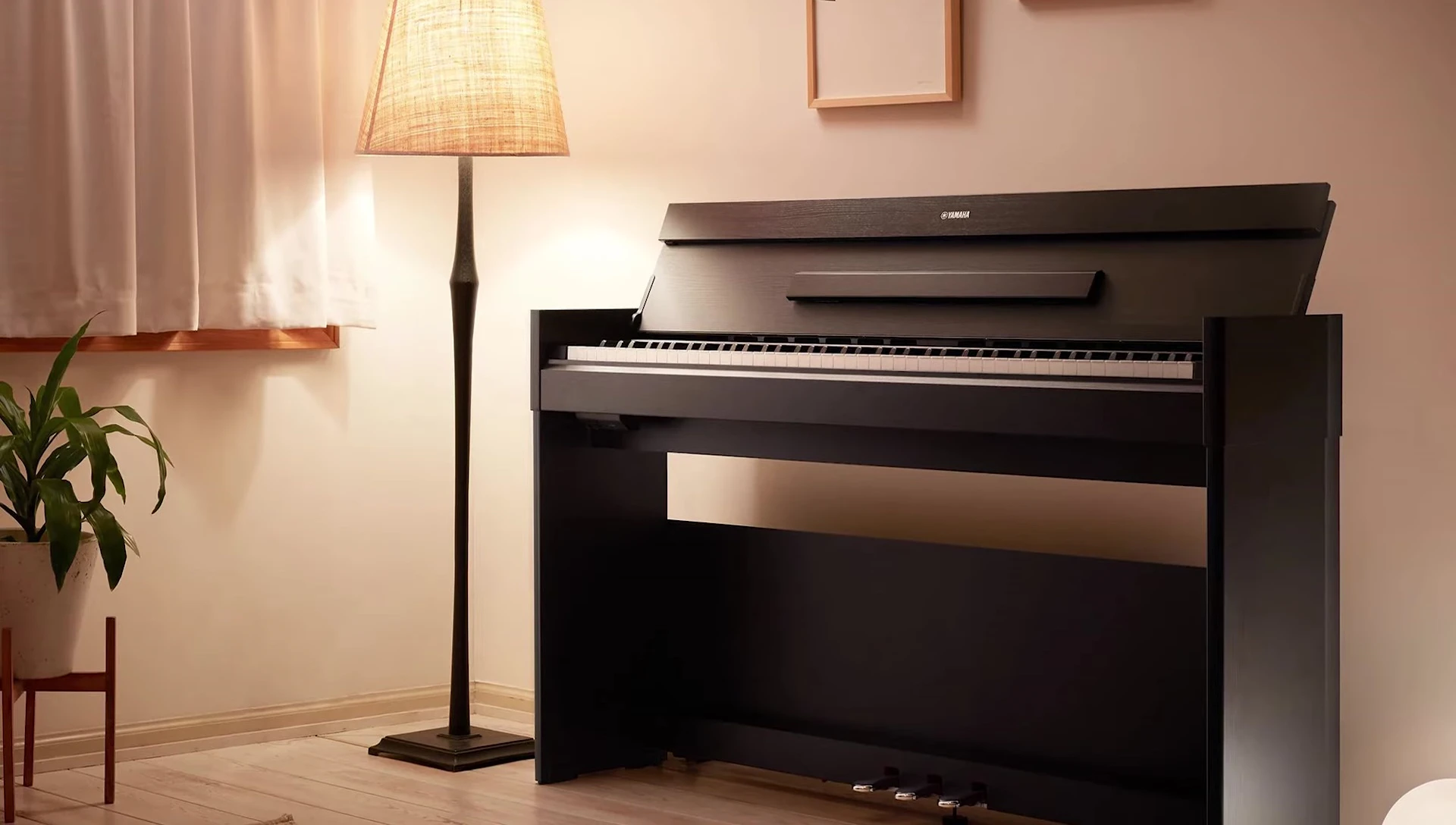 Full shot of the Yamaha ARIUS YDP-145 showcasing its design.