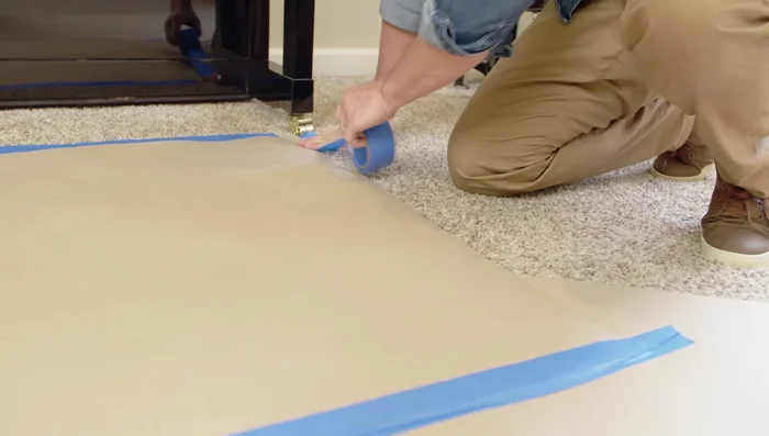 Recruit help (4-5 people) to lift and guide the piano.