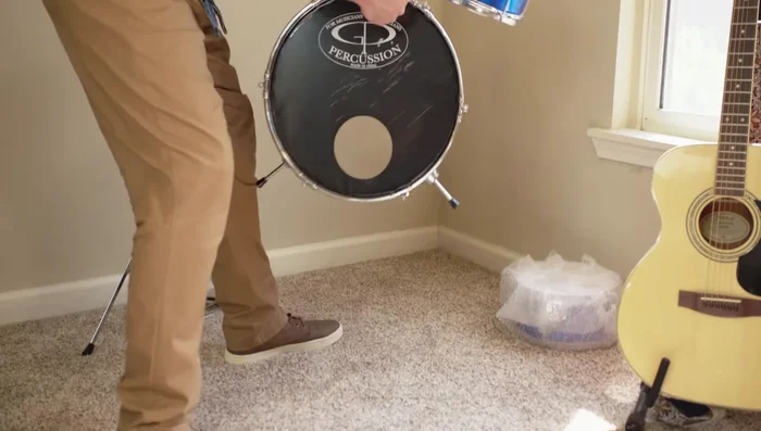 Recruit help (4-5 people) to lift and guide the piano.