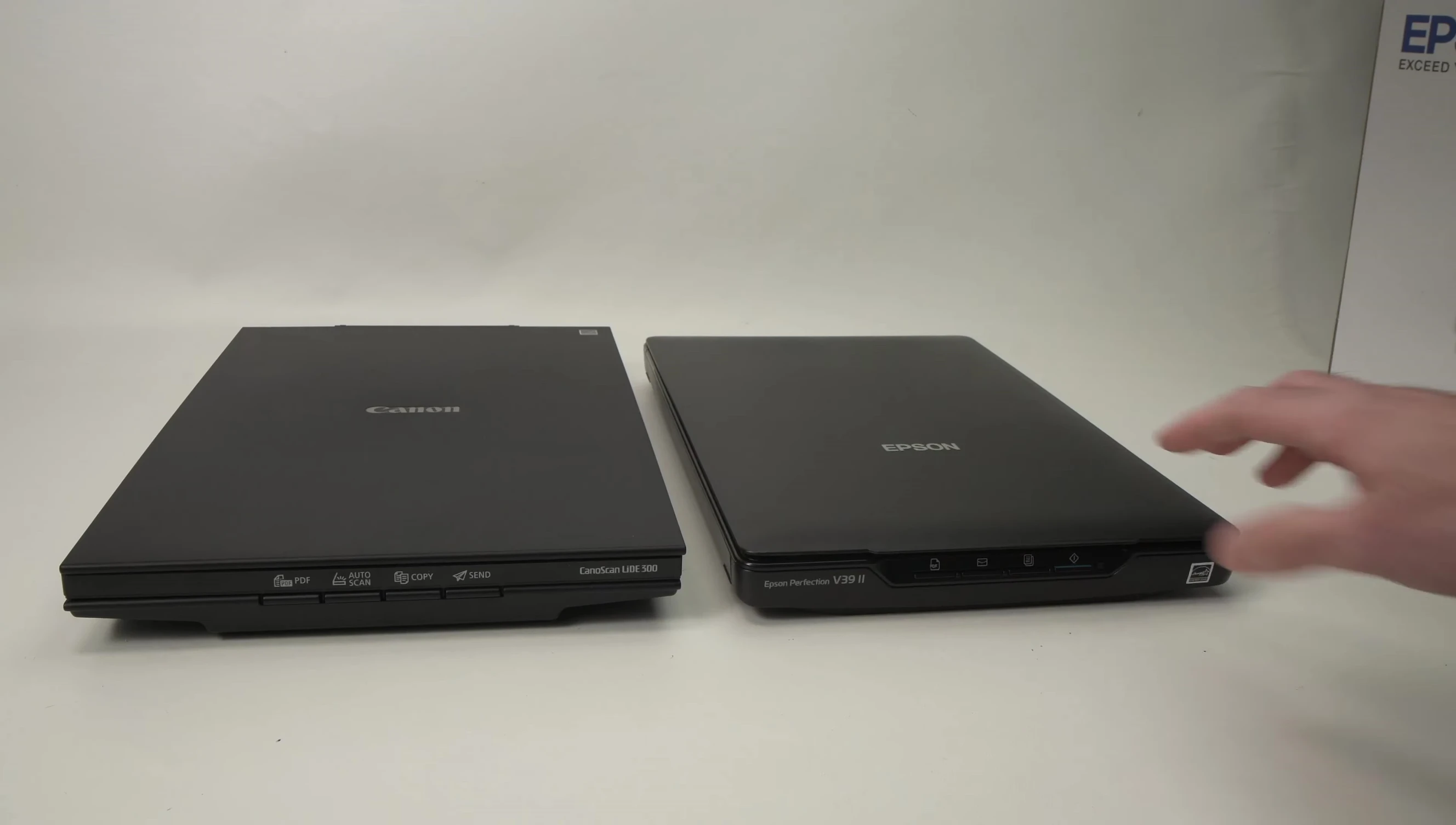 Size comparison of the Epson Perfection V392 and Canon CanoScan LiDE 300.