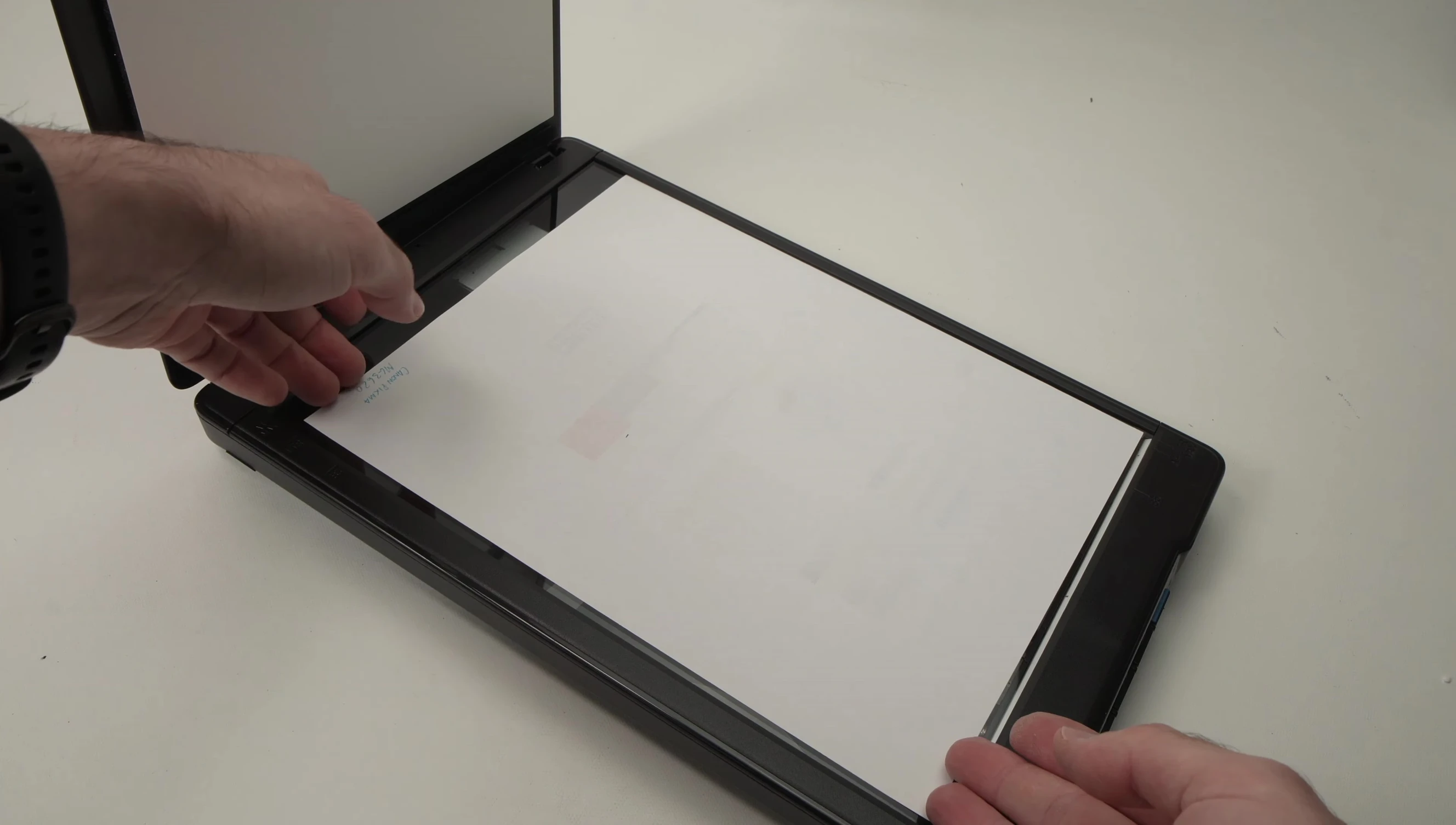 The scanner's scan bed demonstrating its size and capacity.