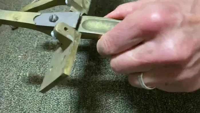 Tighten the four screws at the top of the pedal system using a screwdriver (preferably a Yankee from Stanley with a wide slot) to eliminate side play.