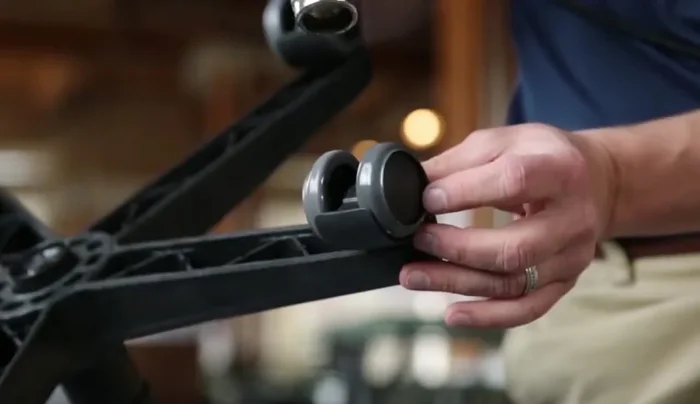 Use a heat gun (or hairdryer on high) to shrink the castor tire onto the wheel. Rotate the wheel 1/2 rotation during the process.