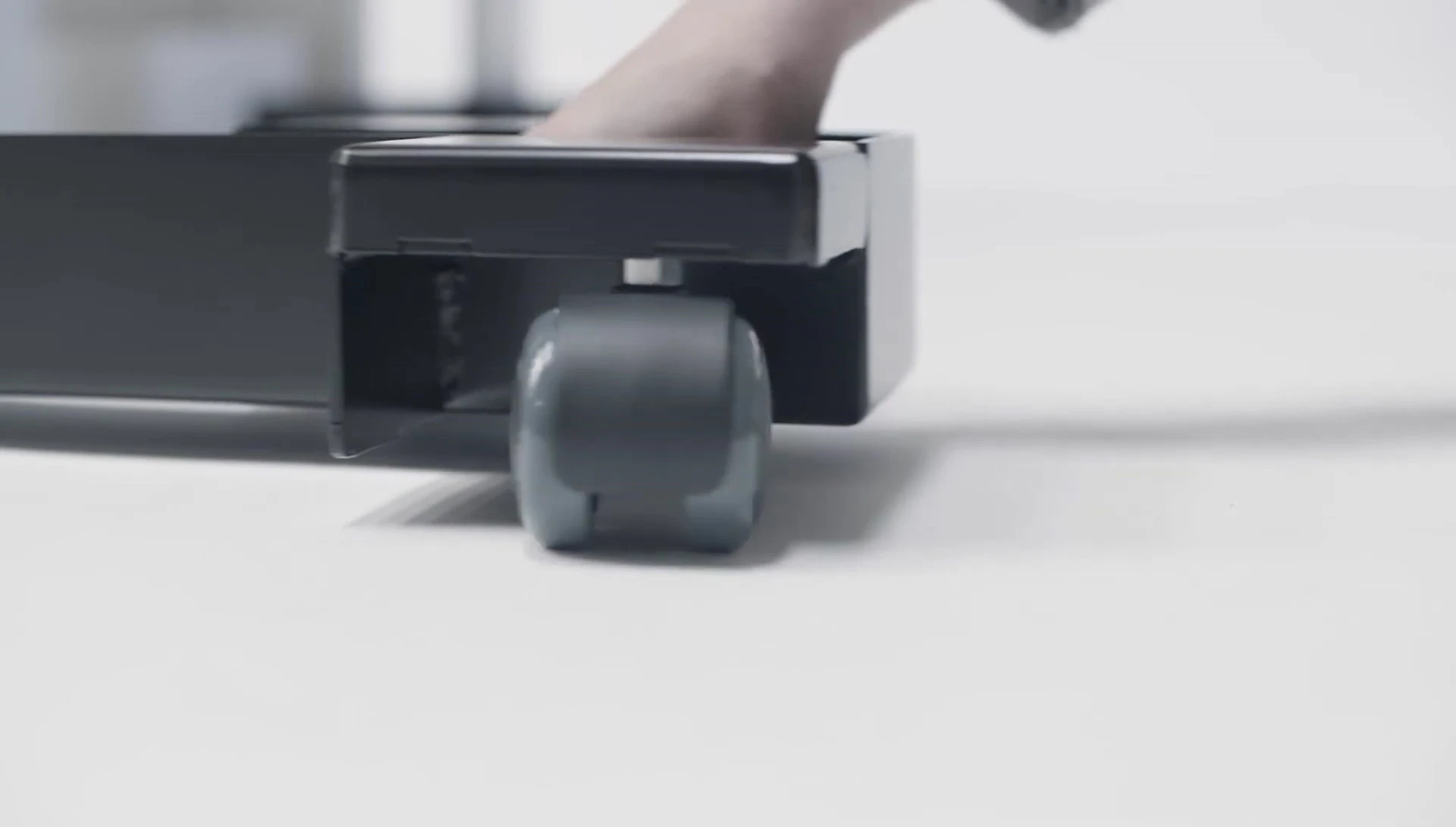 Close-up of the rubber tires on the swivel wheels