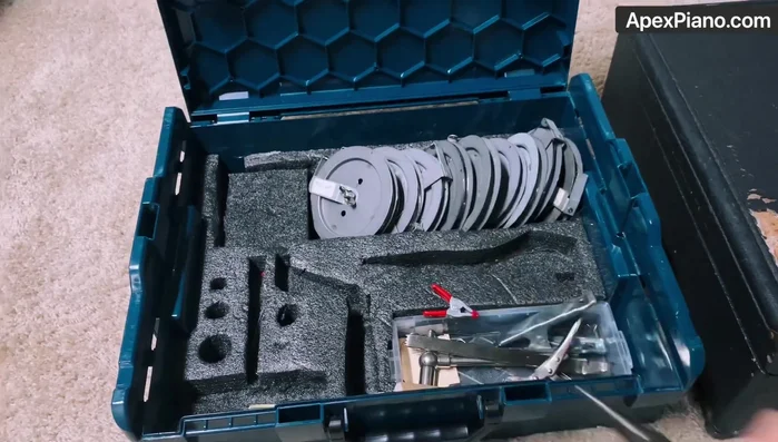 Use needlenose pliers to manipulate strings and coils as needed.