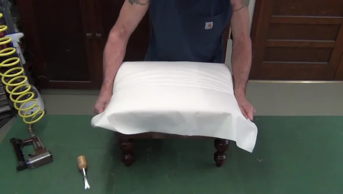 Shaping the upholstery profile using fingertips and palm