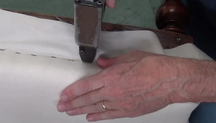 Shaping the upholstery profile using fingertips and palm