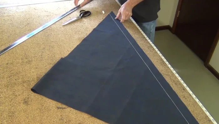 Working the cording out towards the corners, paying attention to profile, weave and fabric