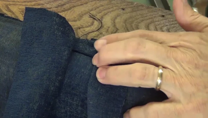 Feathering away excess cotton, using slippies to control rolling