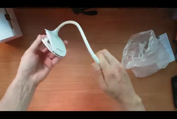 Close-up of the lamp's flexible neck, demonstrating its adaptability.