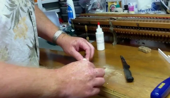 Check the fit of the new key top, ensuring the head is even on the sides. Any overhang should be on the inside of the notch.