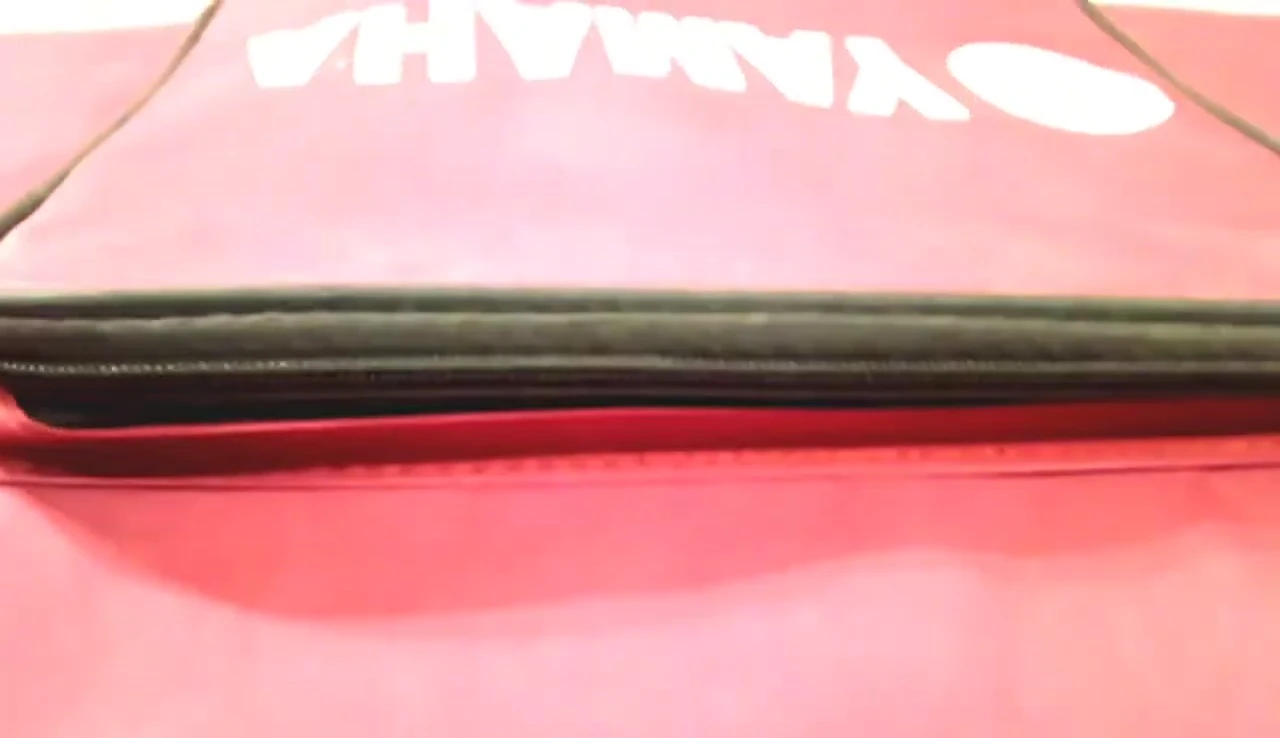 The bag's handle.