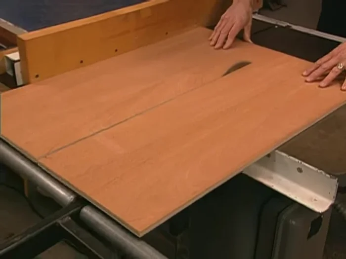 Create bottom panel: Cut and notch a 1/2 in mahogany plywood panel to fit the rabbets.