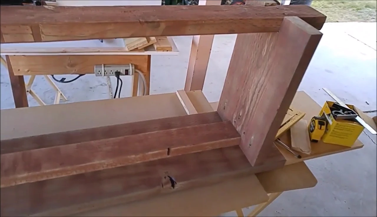 Checking the levelness of the completed bench.