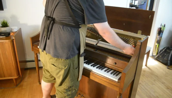 Remove the key stop rail (the piece holding the keys down).