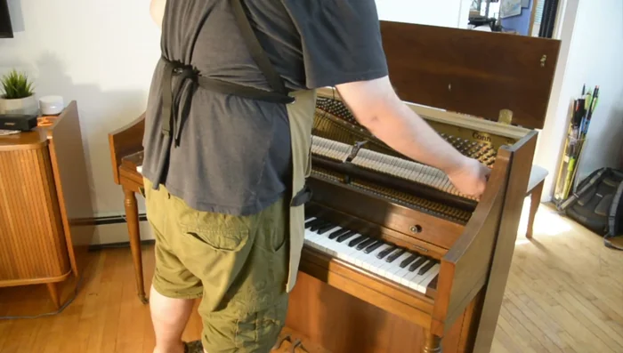 Remove the key stop rail (the piece holding the keys down).