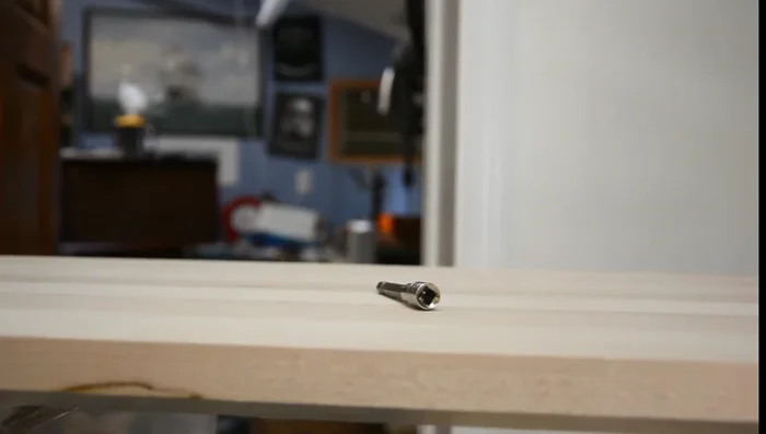 Use a 7/32 hex bit in a ratchet or impact driver to remove the tuning pins.