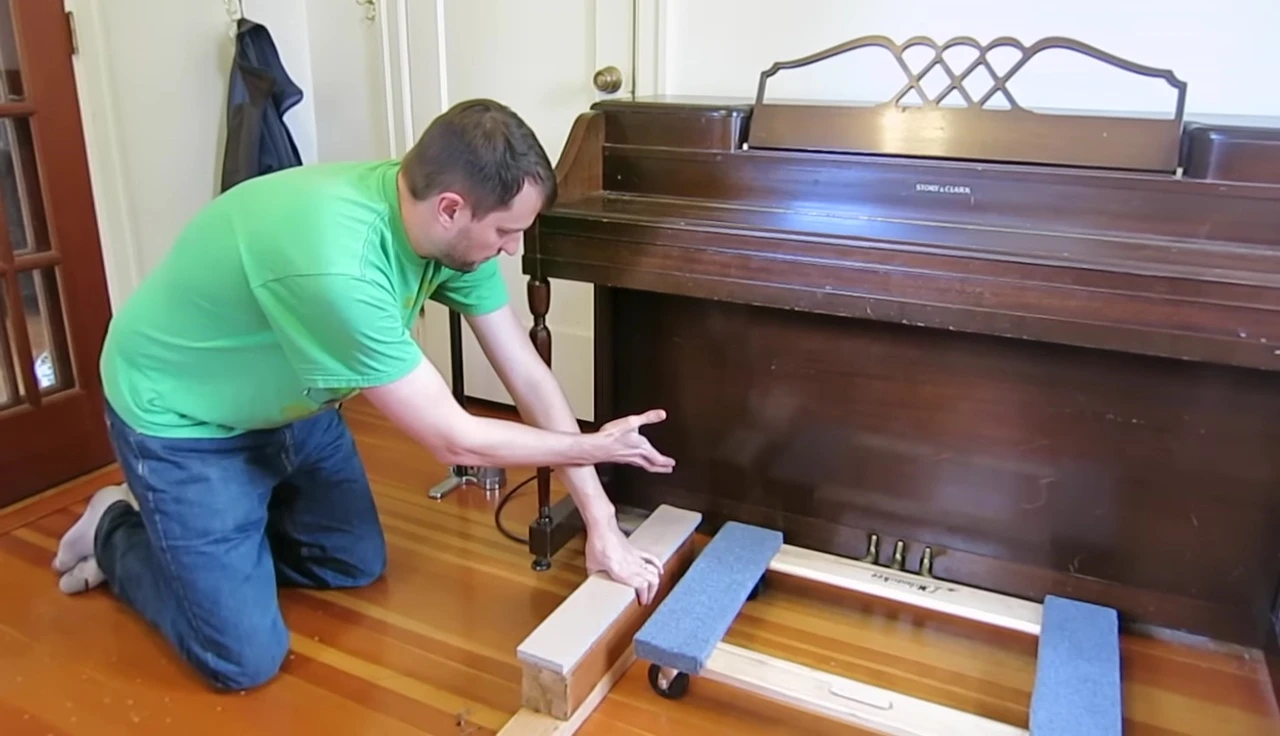 Wooden blocks supporting the piano