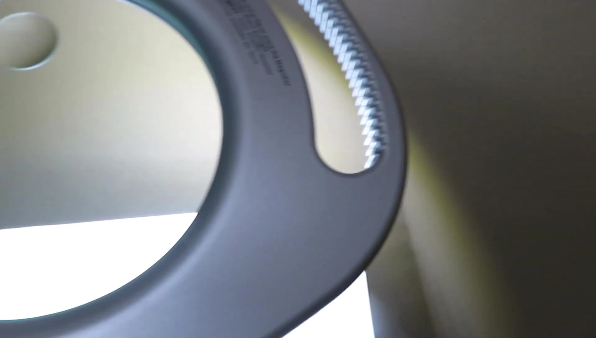 Demonstration of the lamp's brightness through the magnifying glass.
