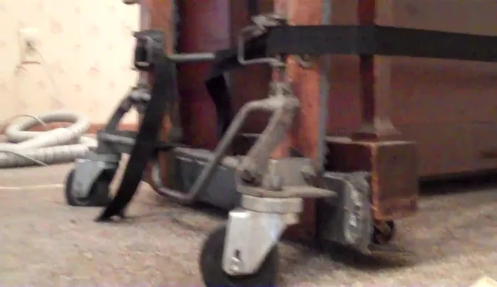 Lower the wheels and move the piano to its new location.